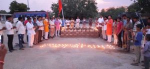 Ayala is illuminated by lamps in the joy of Ram temple foundation stone